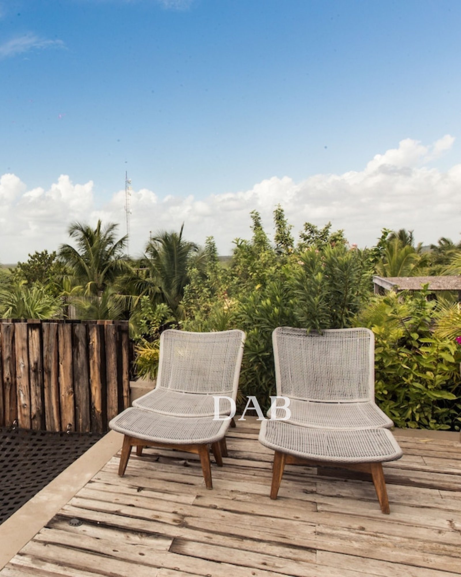 Black lounge chairs for outdoor placed beside the swimming pool