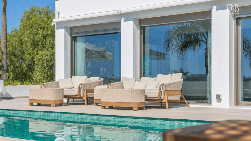 2 sets of rope funiture beside the villa pool