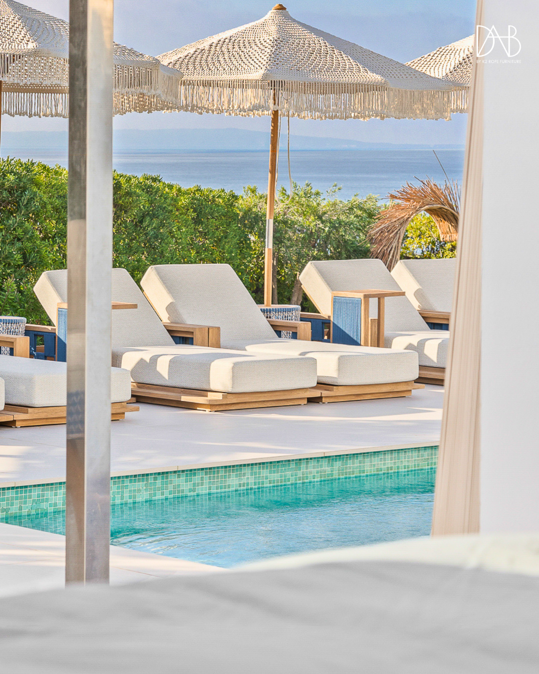 daybeds beside the pools from bedroom view