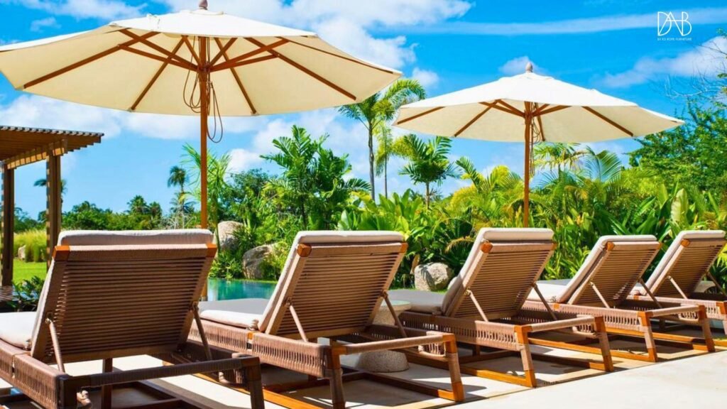 5 outdoor chairs facing the pool